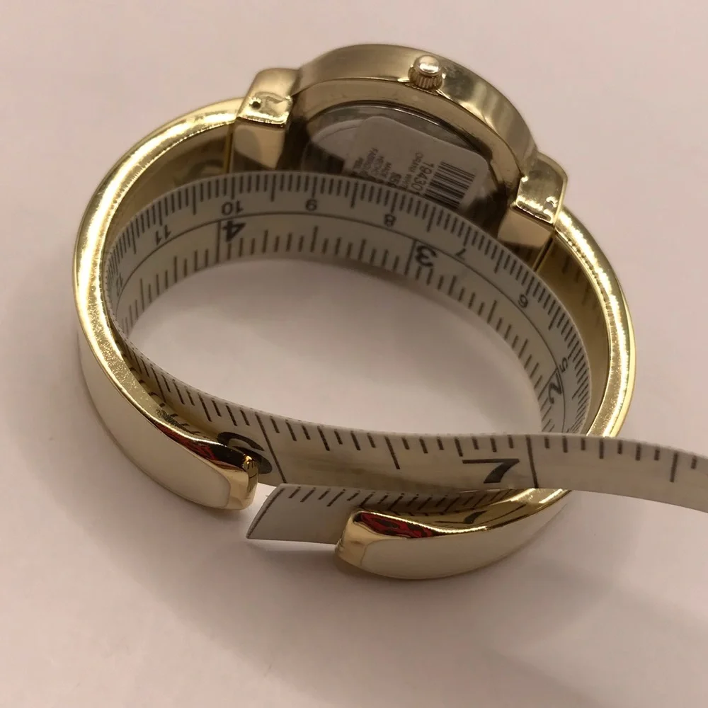 Chico’s Gold-Tone & Cream Hinged Cuff Watch